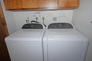 a white washer and dryer in a room at 3336 Pine Hill Road home in South Lake Tahoe