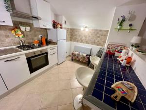 Kuchnia lub aneks kuchenny w obiekcie Ursino holiday apartment