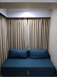 Katil atau katil-katil dalam bilik di RQUI CONDOTEL in NAIA TERMINAL 3 at Two Palmtree Villas