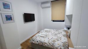 Postel nebo postele na pokoji v ubytování Apartments LORA in Bonila