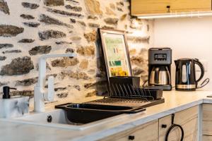 Kuchyňa alebo kuchynka v ubytovaní Charmante maisonnette au cœur des sables d'Olonne