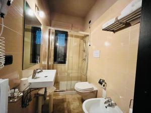 Koupelna v ubytování Magic Hotel