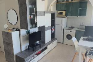 Kuchyňa alebo kuchynka v ubytovaní Apartamento con terraza a pie de playa