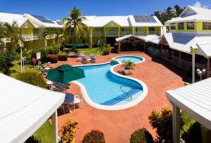 an aerial view of a resort with a swimming pool at Bay Gardens Hotel in Gros Islet