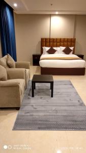 Voodi või voodid majutusasutuse يان للشقق المخدومة - Yan Apartments toas