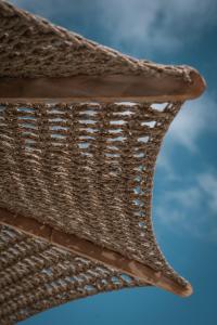 a close up view of the edge of a wickericker at Cilon Suites Santorini in Imerovigli