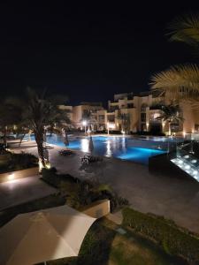 The swimming pool at or close to Mangroovy - 2BR La Blanca Pool View