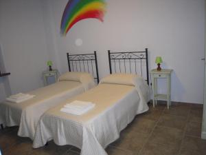 Postel nebo postele na pokoji v ubytování AGRITURISMO PODERUCCIO