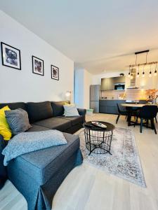 a living room with a couch and a table at Apt Ljupka - Zadar - with private free parking in Zadar