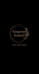 un logotipo para una casa convencional vengacional con una sombrilla en Yangzom Homez en Siliguri