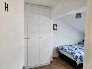 Postel nebo postele na pokoji v ubytování Jey's Flat