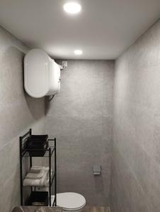 Koupelna v ubytování Apartamento blanco y negro en el centro