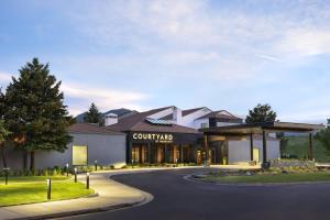 a rendering of the front of a resort building at Courtyard by Marriott Boulder in Boulder