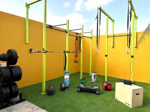 The fitness centre and/or fitness facilities at Cloud Tropical - Piscina climatizada - Gym Privado
