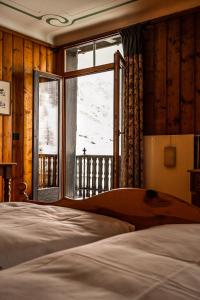 Postel nebo postele na pokoji v ubytování Hotel Fex
