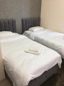 Voodi või voodid majutusasutuse RP HOTEL (NEW) toas