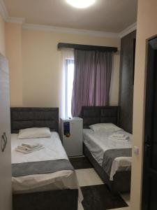 Voodi või voodid majutusasutuse RP HOTEL (NEW) toas