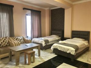 Voodi või voodid majutusasutuse RP HOTEL (NEW) toas