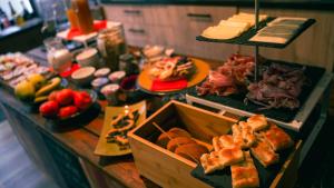 a buffet with many different types of food on a table at Piccolo Borgo in Chiavari