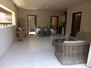 Area soggiorno di Beachfront Villa by M&H
