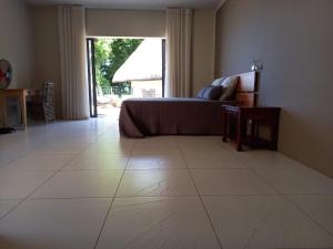 Area soggiorno di Beachfront Villa by M&H