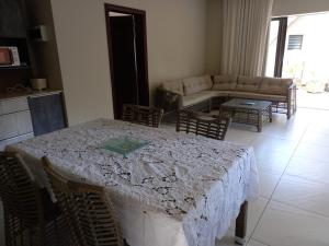 Area soggiorno di Beachfront Villa by M&H