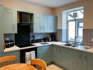 Köök või kööginurk majutusasutuses Lindum Cottage