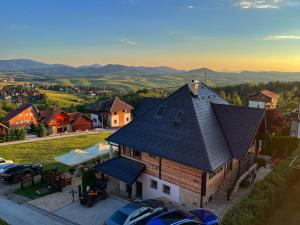 an aerial view of a house with a roof at Vila Breg Zlatibor in Zlatibor