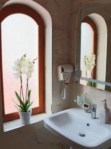 Ванная комната в Hotel Villa Margarit