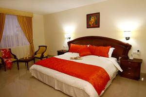 Postel nebo postele na pokoji v ubytování Hotel Club del Sol