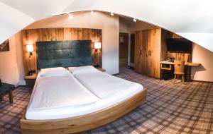 Postel nebo postele na pokoji v ubytování Hotel Sendlhof
