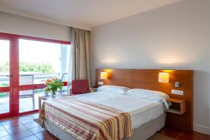 Кровать или кровати в номере Parador de Nerja
