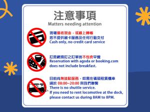 a sign that says no trucks or no parking permitted at Xiao Liuqiu Mediterranean B&B in Xiaoliuqiu