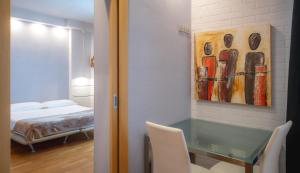 Posteľ alebo postele v izbe v ubytovaní Réva Residences and Pool