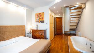 Posteľ alebo postele v izbe v ubytovaní Réva Residences and Pool