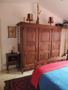 Łóżko lub łóżka w pokoju w obiekcie Maison dans la Provence Verte