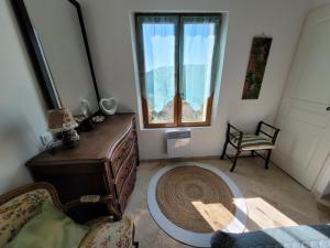 Łóżko lub łóżka w pokoju w obiekcie Maison dans la Provence Verte