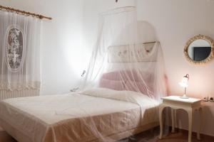 Posteľ alebo postele v izbe v ubytovaní Elise Cottage