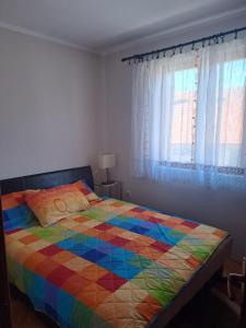 Una cama o camas en una habitación de KolasinApartman Luis