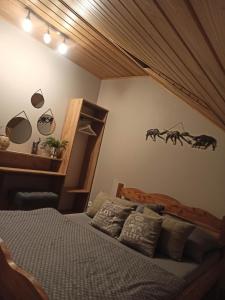 Katil atau katil-katil dalam bilik di Apartament 6 osobowy