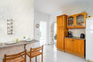 Kuchyň nebo kuchyňský kout v ubytování Villa Sabah by Costarentals - Ref 119