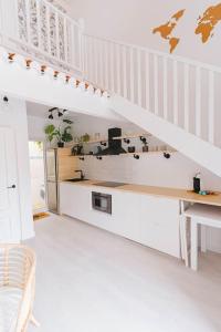 Kuchyň nebo kuchyňský kout v ubytování UNIQUE LOFT