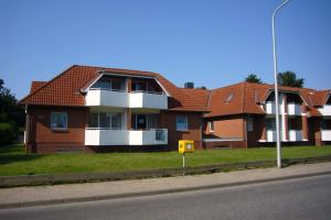 SahlenburgにあるLand & Meer 24の通路側の家