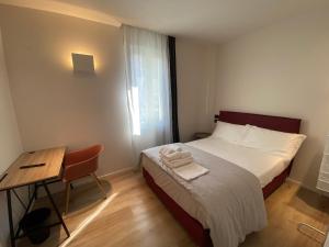 Voodi või voodid majutusasutuse Prato della Valle Apartments toas