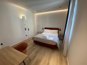Voodi või voodid majutusasutuse Prato della Valle Apartments toas