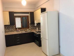 A cozinha ou cozinha compacta de Villa Muca Durres