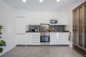 Kuchyň nebo kuchyňský kout v ubytování Apartamento en Bolnuevo