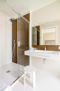 a bathroom with a sink and a mirror at Shoruq in Marsala