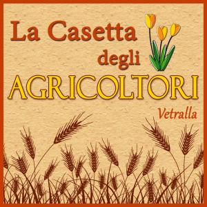um sinal que diz la casita del agriculture com flores em La casetta degli agricoltori em Vetralla