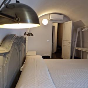 Voodi või voodid majutusasutuse B&B L'Orto Sul Tetto toas